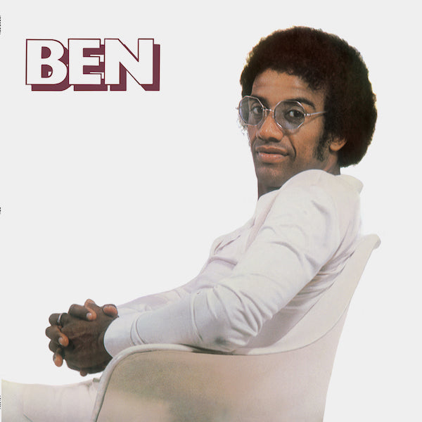 Person sitting in a chair with 'BEN' text above on a white background