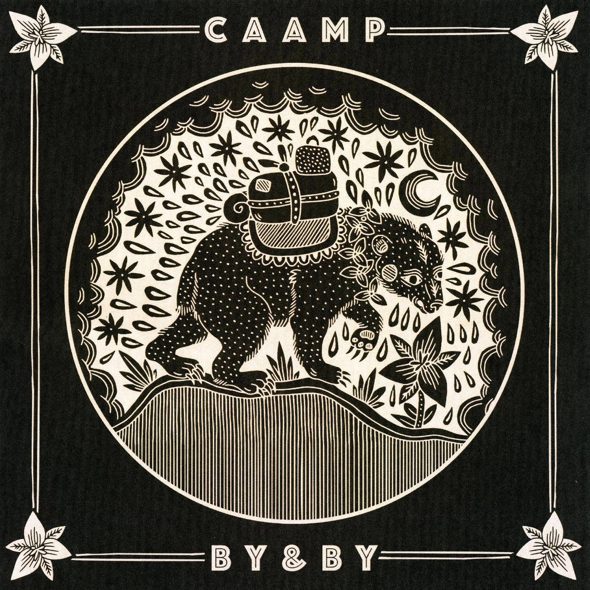 Black and white illustration of a bear with a suitcase and flowers, framed by decorative elements and the text 'CAAMP BY & BY' on a black background.