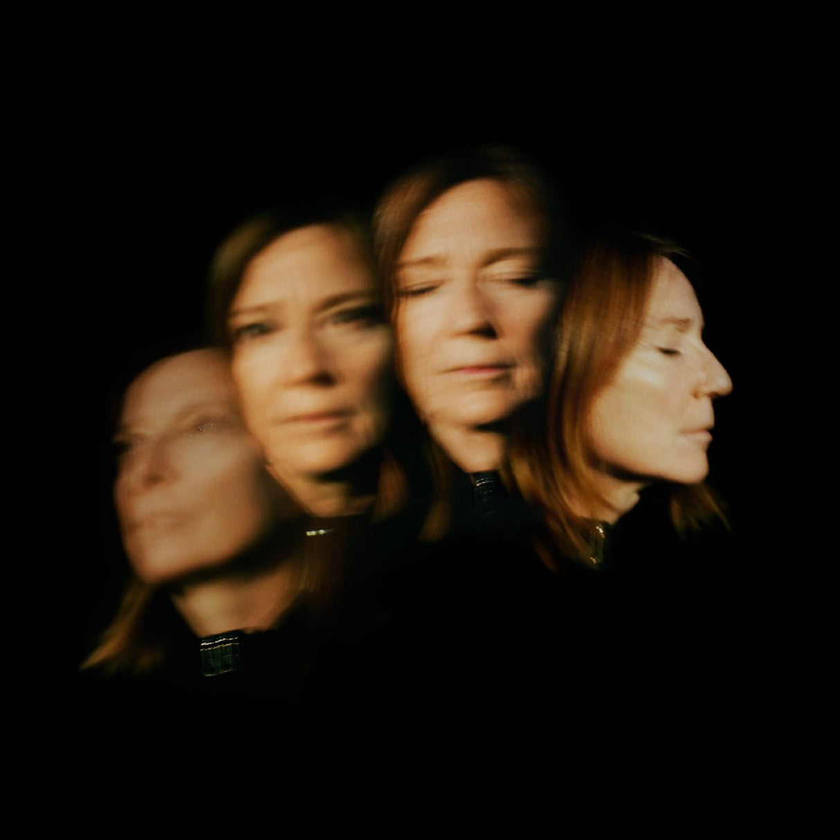 A blurred black and white image of a person with a contemplative expression, likely representing the album cover for 'Lives Outgrown' by Beth Gibbons.