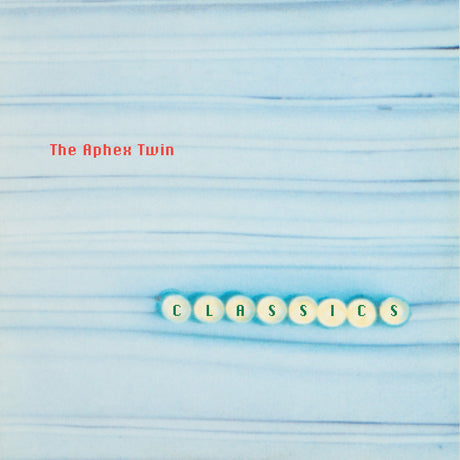 Album cover for 'Classics' by The Aphex Twin with blue and white striped pattern
