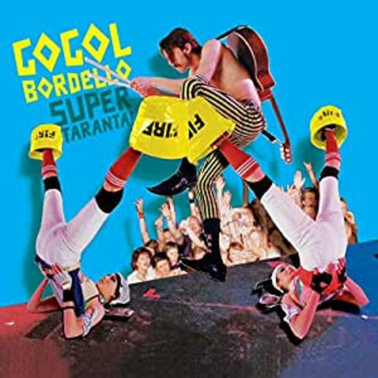 Album cover with three people in acrobatic poses against a blue background, featuring the text 'Gogol Bordello Super Taranta'.