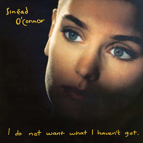 Album cover of Sinéad O'Connor with the title 'I do not want what I haven't got' featuring a close-up of Sinéad O'Connor's face with a dark background.
