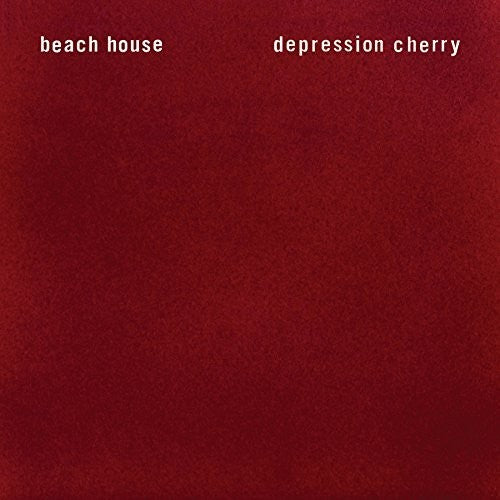 The image displays the cover of Beach House's album 'Depression Cherry'. The album cover is a plain, solid red background with the band's name 'beach house' written in a simple white font at the top and the album title 'depression cherry' in a larger white font centered at the bottom.