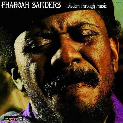 Album cover of Pharoah Sanders - Wisdom Through Music LP featuring a photo of Pharoah Sanders with his eyes closed, expressing a musical theme.