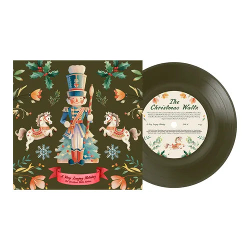 A 7-inch vinyl record titled 'The Christmas Waltz' by Laufey, featuring a Christmas-themed cover with a snowman, trees, and decorations.
