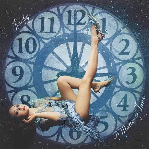 Person in a flowing dress lying on the ground with a large clock in the background