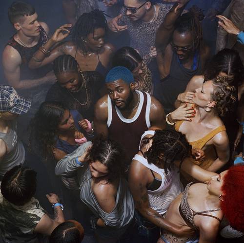 Group of people in a crowded indoor setting