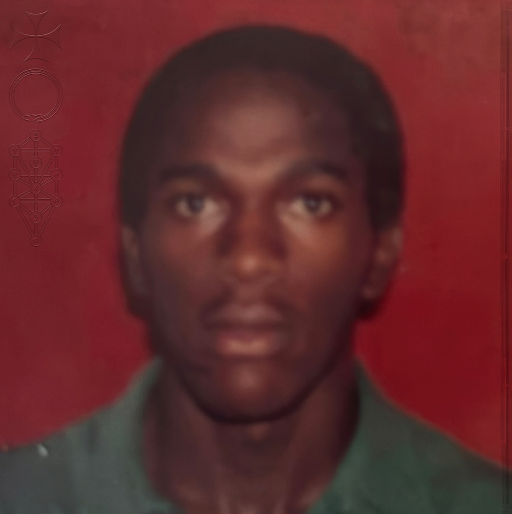 Person wearing a green shirt against a red background