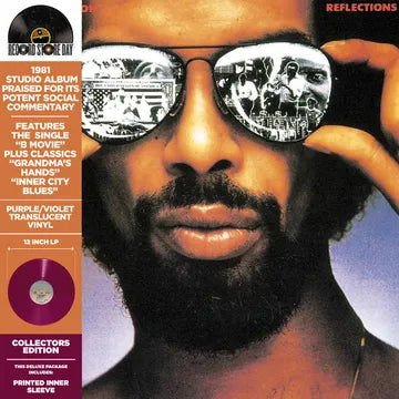 Album cover with a person wearing reflective sunglasses and text on the left side.