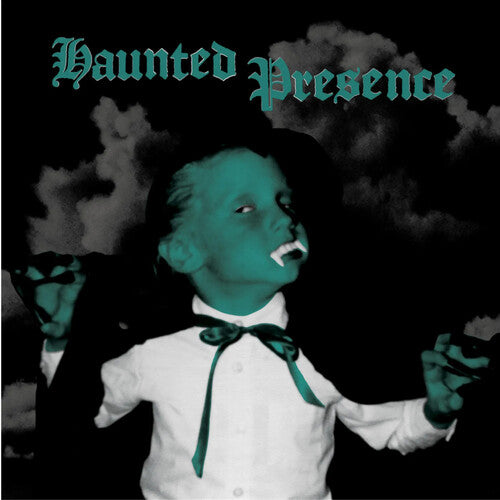 A vinyl record titled 'HAUNTED PRESENCE' with a dark cover featuring a child with a ghostly appearance in the foreground, and a cloudy, misty background.