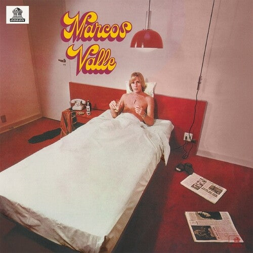 Album cover with a person lying in bed, red walls, and 'Marcos Valle' text.