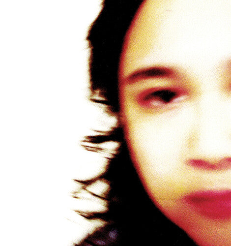 Close-up of a person's face with a blurred background