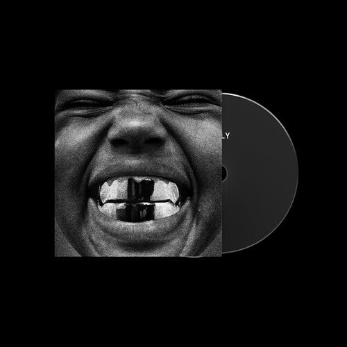 Vinyl record with a close-up of a person's mouth and a black and white design on a black background