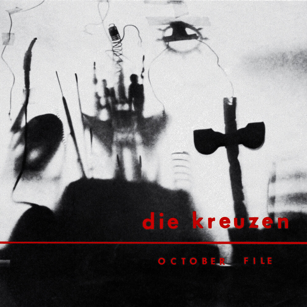 Album cover with abstract black and white design and text 'die kreuzen October File' at the bottom.