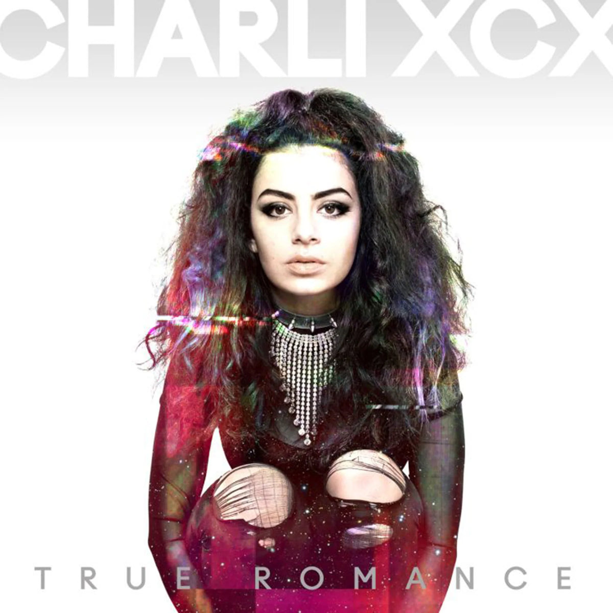 Album cover with a person with colorful hair and 'Charli XCX' branding