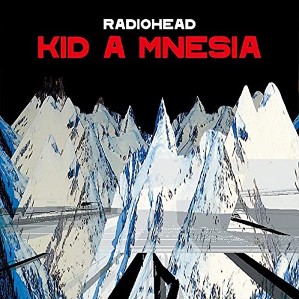 Album cover for Radiohead's 'Kid A Mnesia' with geometric shapes and black background.