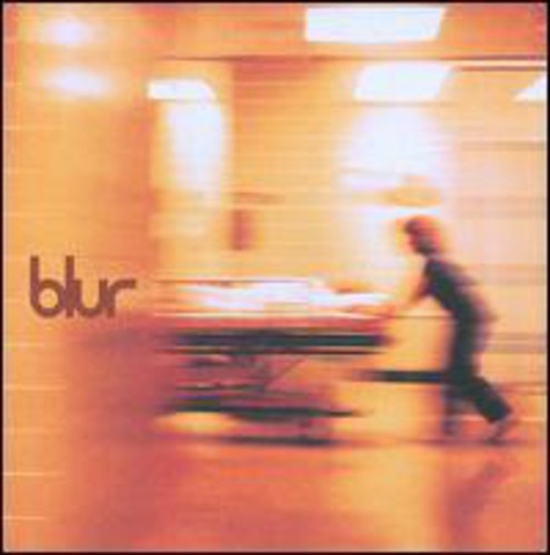 This image features the album cover for "Blur - Blur LP," capturing a moment that seems to encapsulate the blurred, fast-paced essence of the band's music. The cover depicts a hospital corridor with a figure in a gray surgical gown and cap, rushing forward with a sense of urgency.