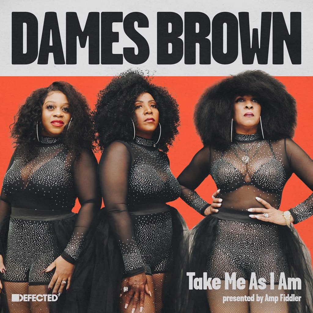 Three women in glamorous outfits with 'Dames Brown' and 'Take Me As I Am' text on a red background.