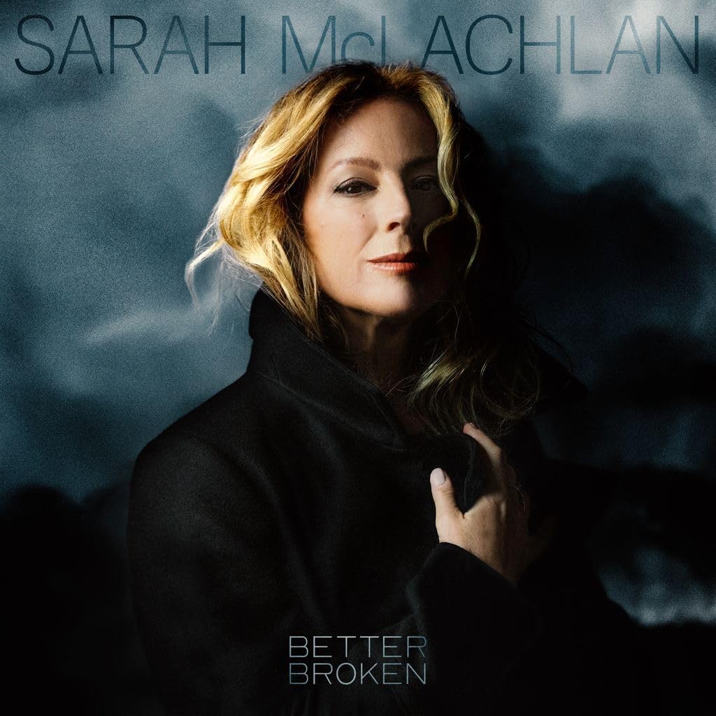 Album cover with a person wearing a dark coat against a cloudy sky, featuring the text 'Sarah McLachlan' and 'Better Broken'.
