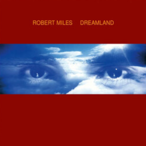 Album cover for Robert Miles' Dreamland featuring a red background with a close-up of eyes looking towards the light.