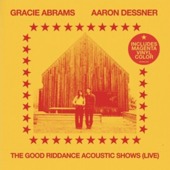 Cover of the 'The Good Riddance Acoustic Shows (Live) LP (Magenta Vinyl)' featuring a photograph of Gracie Abrams and Aaron Dessner in front of a wooden structure, with a magenta vinyl color note.