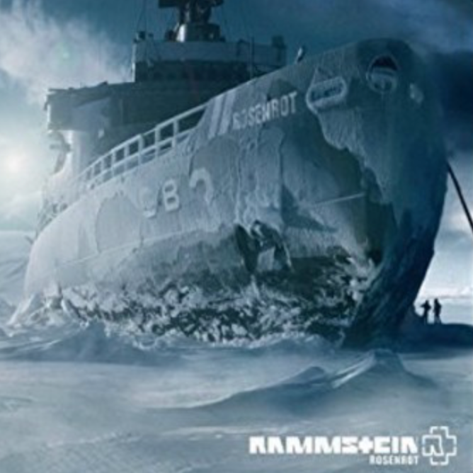 Icebreaker ship breaking through ice with 'Ramses II' visible, set against a stormy sky.