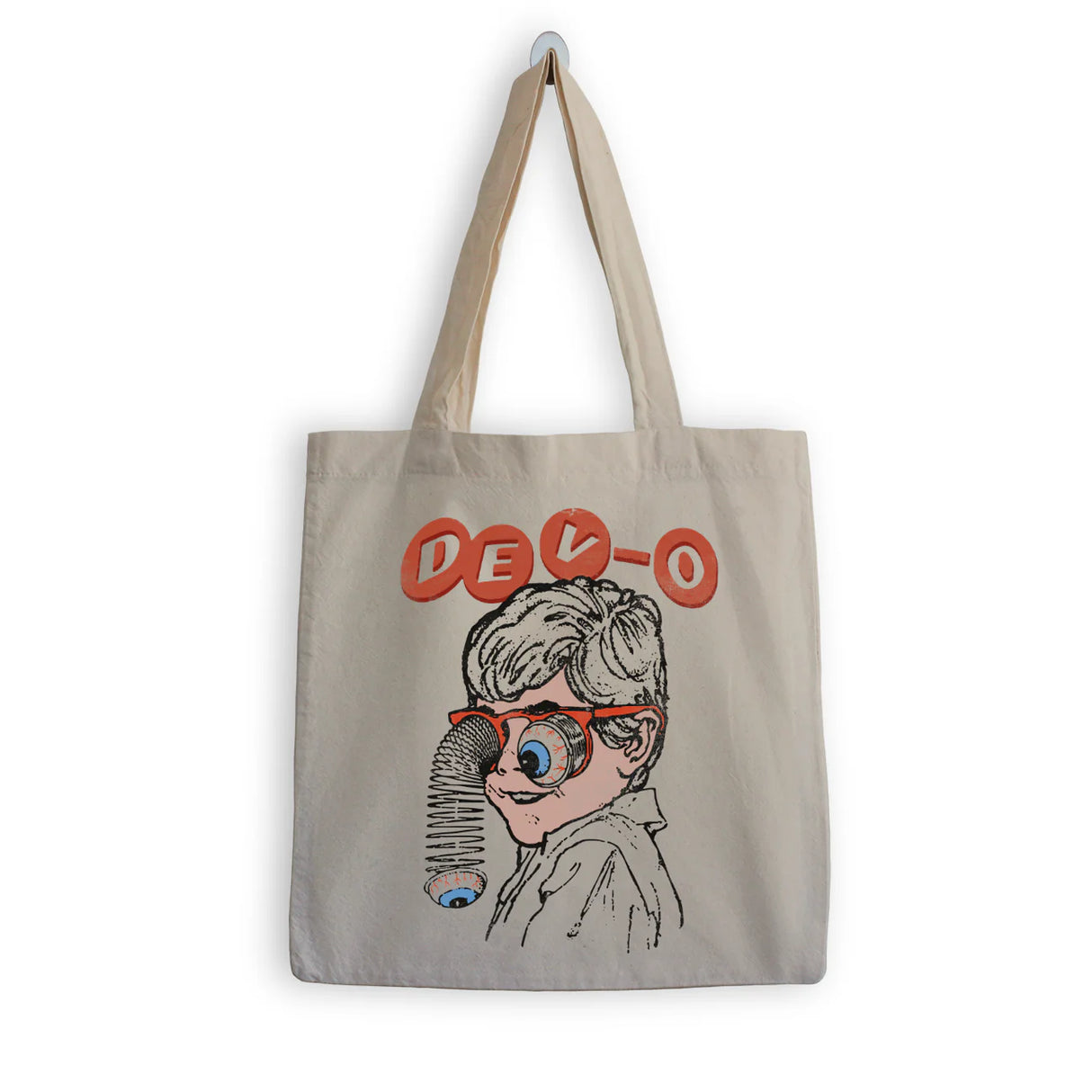 Tote bag with a graphic of a character wearing glasses and 'DEVO' text on a beige background