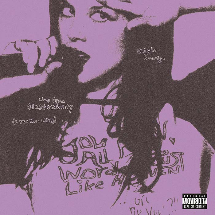 Album cover with stylized text and a person holding a microphone on a purple background