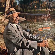 Album cover for 'Song for Father' by Horace Simpson, featuring a portrait of the artist in a hat and suit seated outdoors by a river.