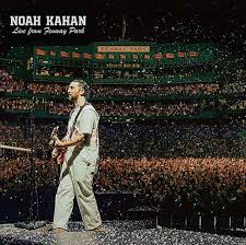 Cover art for Noah Kahan's live album from Fenway Park featuring a photo of Noah Kahan performing on stage with a crowd in the background.