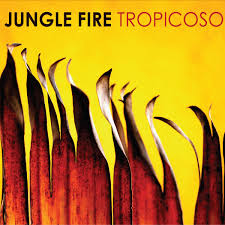 Album cover with abstract design and text 'Jungle Fire Tropicoso' on a yellow background