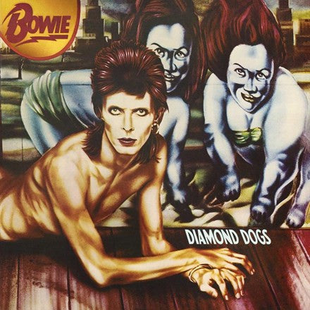 The image features the album cover for David Bowie's LP 'Diamond Dogs'. The cover artwork is striking with its dark, moody background and vivid, surrealistic portraits of David Bowie and two other figures.