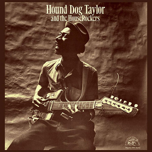 A black and white album cover featuring Hound Dog Taylor playing an electric guitar with the title 'Hound Dog Taylor and the HouseRockers' above.