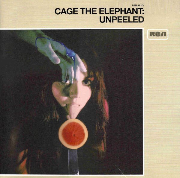 This image features the album cover for "Cage The Elephant: Unpeeled," a 2LP record released by RCA. The cover artwork is striking with its dark, moody background and a close-up photograph of a person's face, accentuated by a blue mark on the cheek.