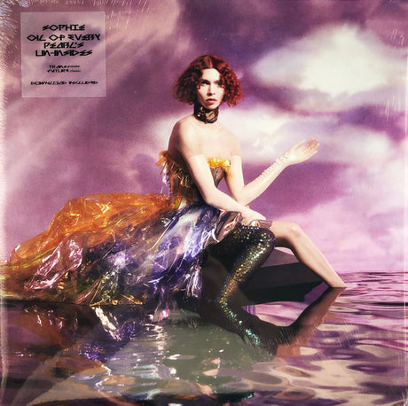 Album cover featuring a person with red hair sitting in a vibrant, purple environment that resembles a stylized version of the ocean with sequined fabric.