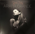 Ariana Grande album cover for 'Yours Truly' LP featuring a black and white image of Ariana Grande with the album title text above.