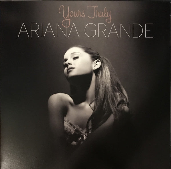 Ariana Grande album cover for 'Yours Truly' LP featuring a black and white image of Ariana Grande with the album title text above.