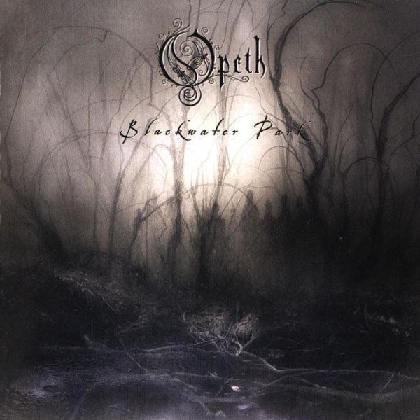 Album cover for Opeth's Blackwater Park featuring a dark, forest-like scene with a eerie ambiance.