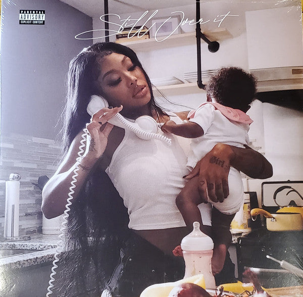 Album cover featuring a woman holding a baby and speaking on a payphone, with a kitchen background. The album is rated PARENTAL ADVISORY.