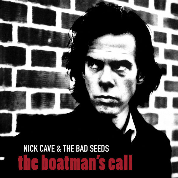 Black and white photo of Nick Cave with a brick wall in the background, album title 'The Boatman's Call' by Nick Cave & The Bad Seeds is visible.
