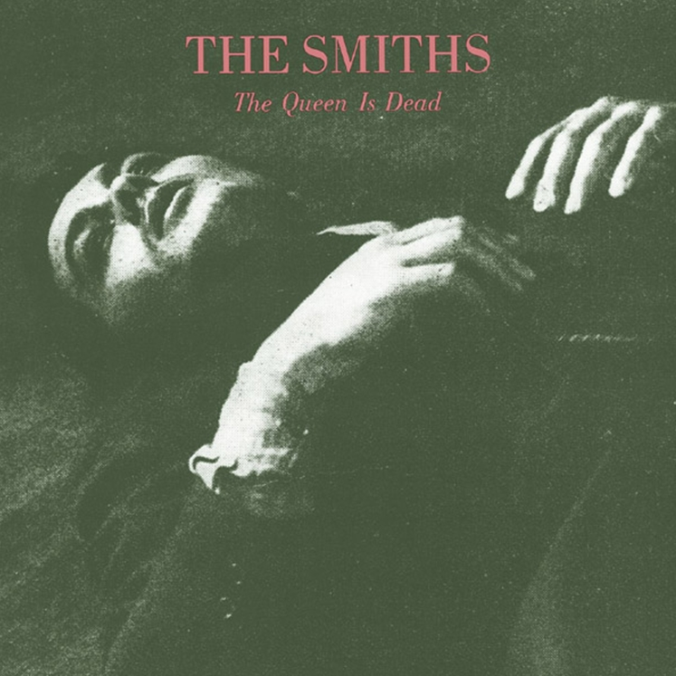 The album cover features a black and white photograph of a person lying down, with the band 'The Smiths' and the album title 'The Queen Is Dead' printed at the top.