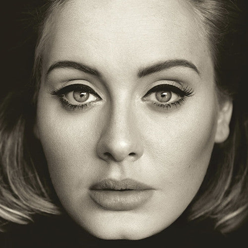 Black and white image of Adele, with a focus on her face and eyes.