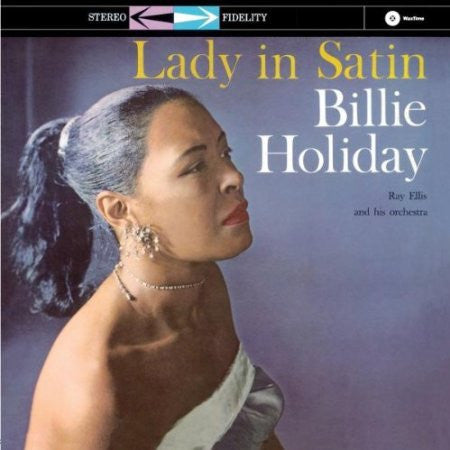 Album cover for 'Lady in Satin' featuring Billie Holiday with a blue and gray background.