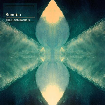 This image features the album cover for "Bonobo - The North Borders 2LP." The artwork is abstract and utilizes a muted, earthy color palette with dark blues and whites, creating a sense of depth and texture.