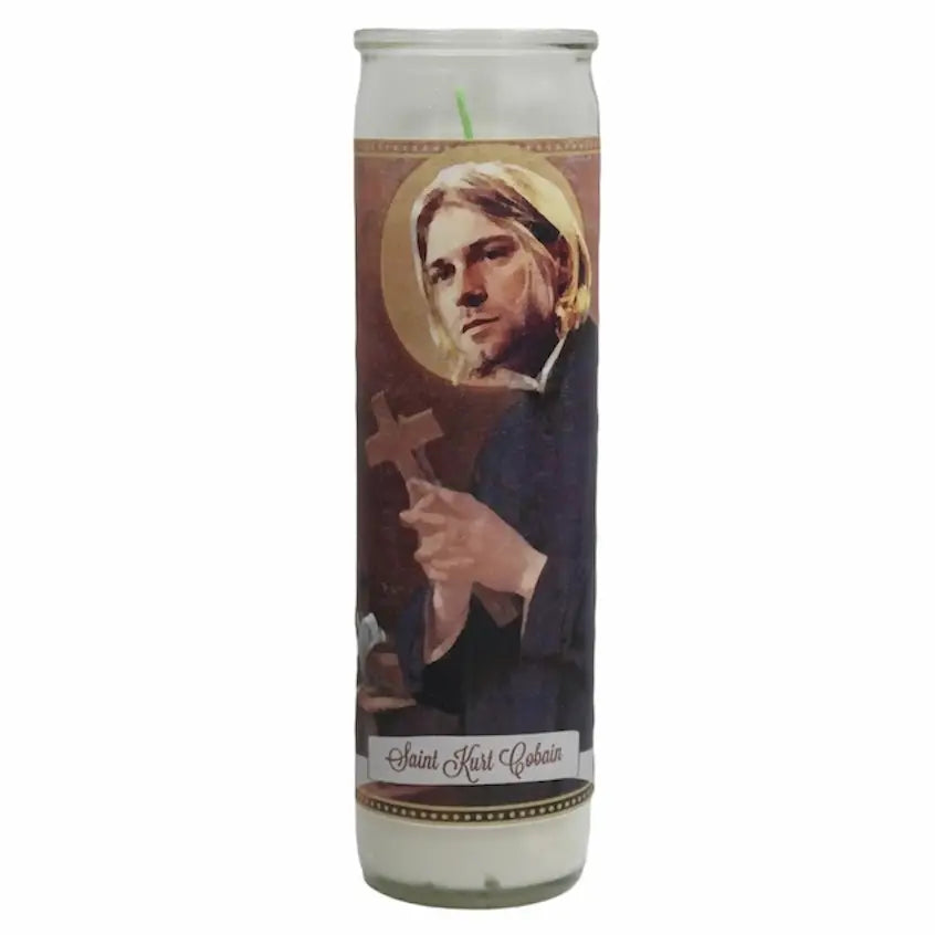 Candle with a portrait of a person holding a cross on a white background