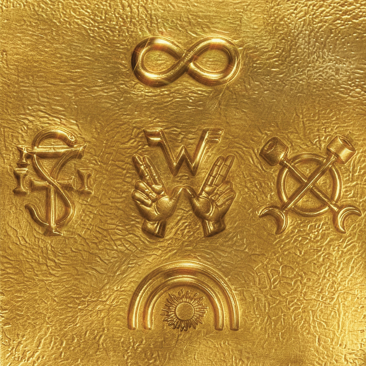 Gold embossed symbols on a textured gold background