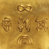 Gold embossed symbols on a textured gold background