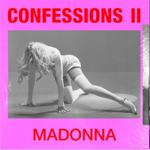 Album cover of 'Confessions II' by Madonna with a pink border and black and white photo of a woman.
