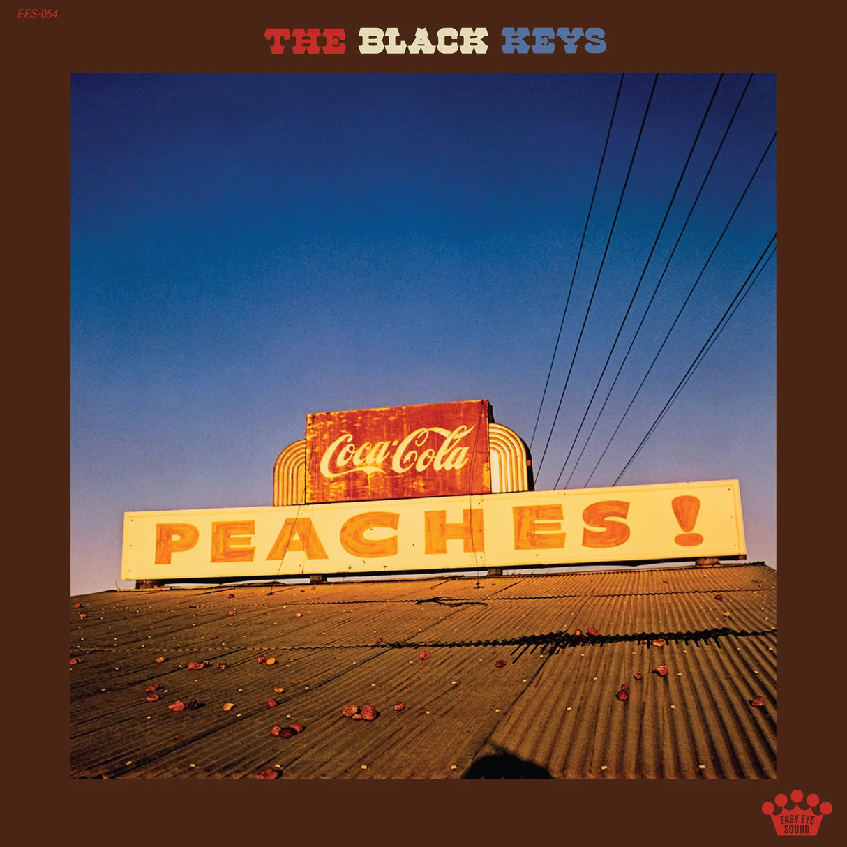 Album cover with 'Peaches!' sign and Coca-Cola logo, featuring 'The Black Keys'.
