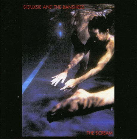 Album cover for 'The Scream' by Siouxsie and the Banshees featuring a person reaching out with a blue light.
